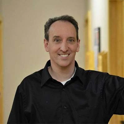 A headshot photo of Dr. Dennis Murvich