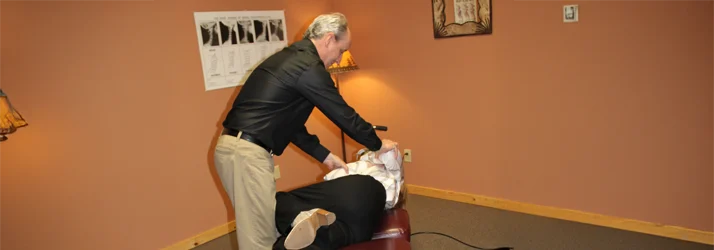 Dr. Murvich adjusting a patient's back
