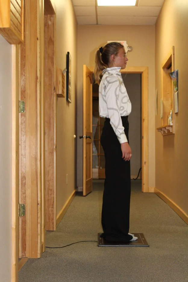 A patient using the gaitscan scanner